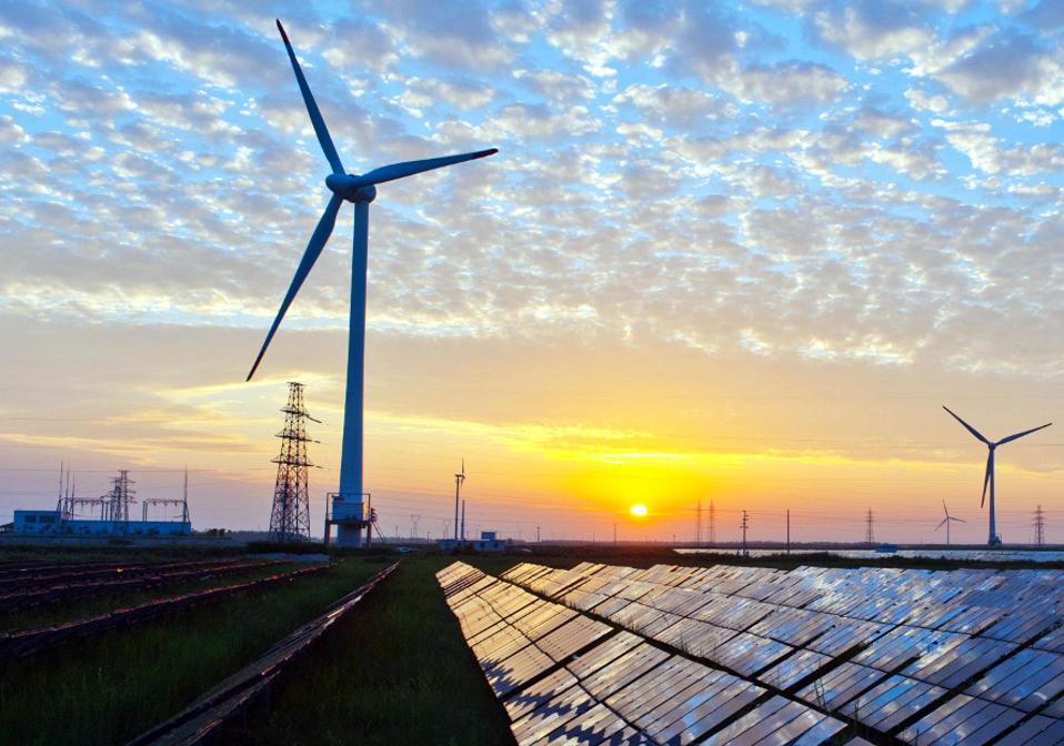 Solar panels, wind turbines, and electricity transmission lines