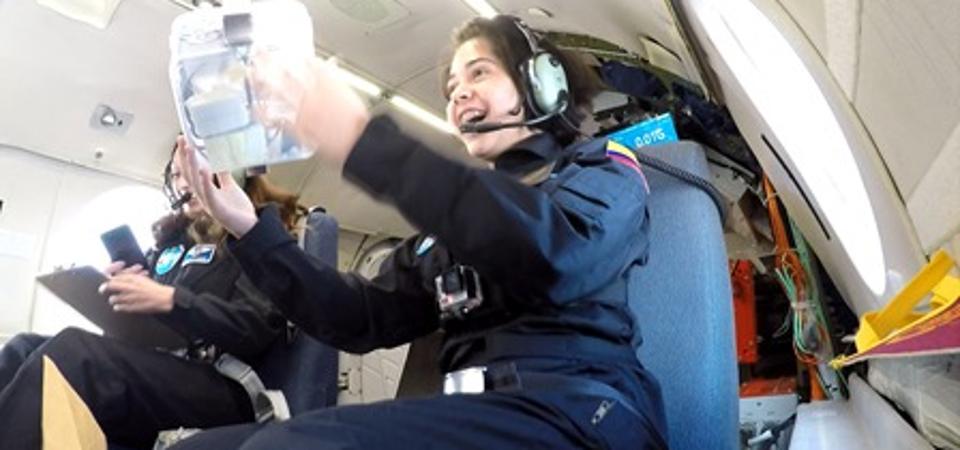 Ivanna Hernandez, 16, from Colombia experiences microgravity on a parabolic flight of Canada's National Research Council (NRC) Falcon-20 aircraft, as part of the PoSSUM microgravity campaign.