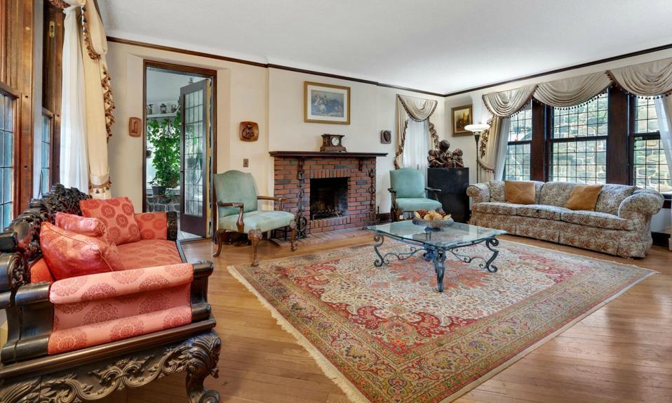 A living room with floral fabrics.