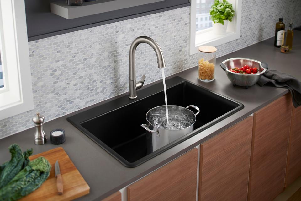 Hands-free kitchen faucet with voice control
