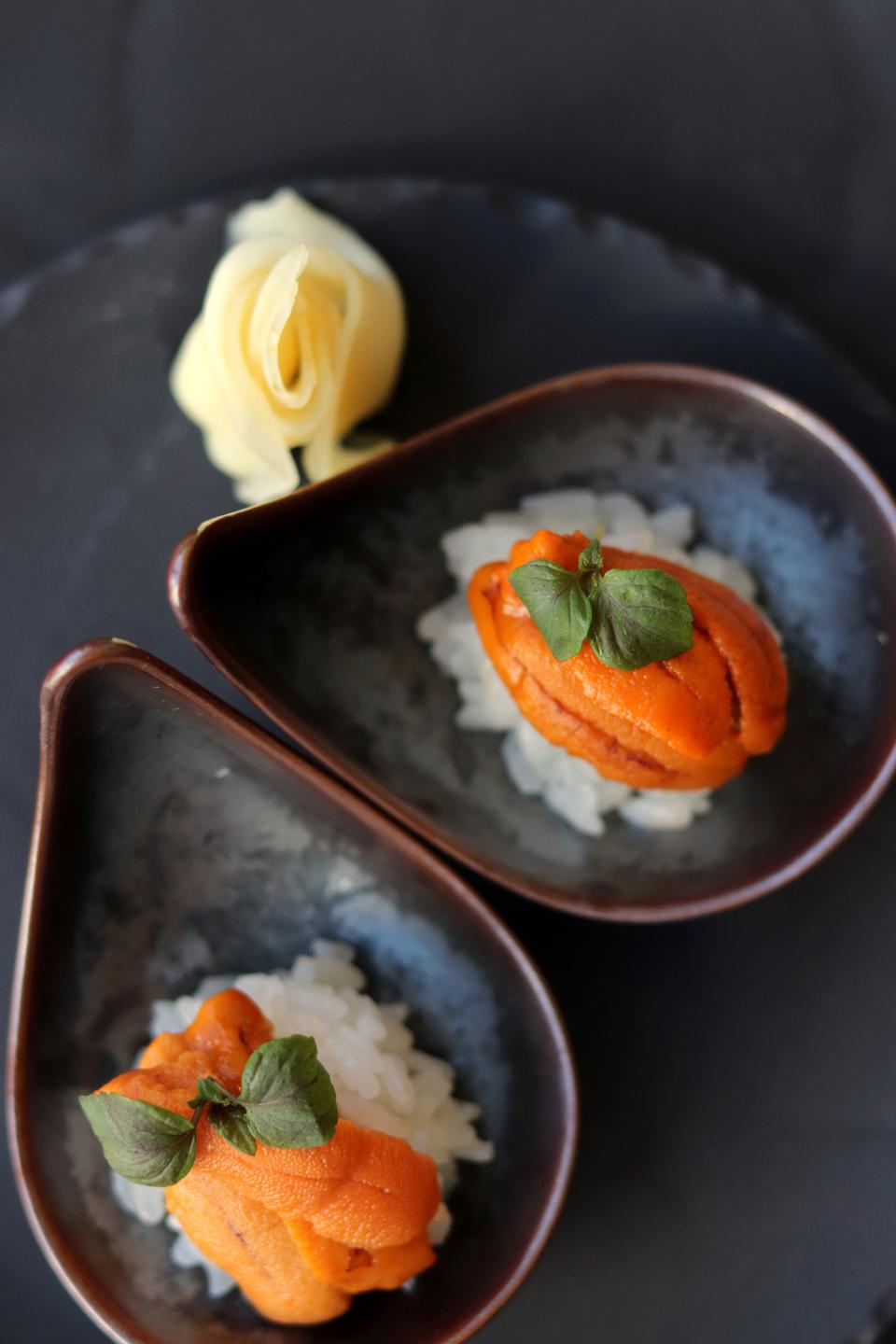 Uni roe served atop rice in a simple and delicious dish.