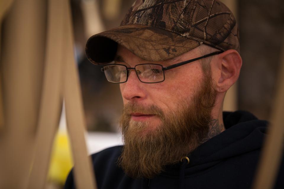 Jeremy Haney, a recovery drug addict makes instruments in Eastern Kentucky.