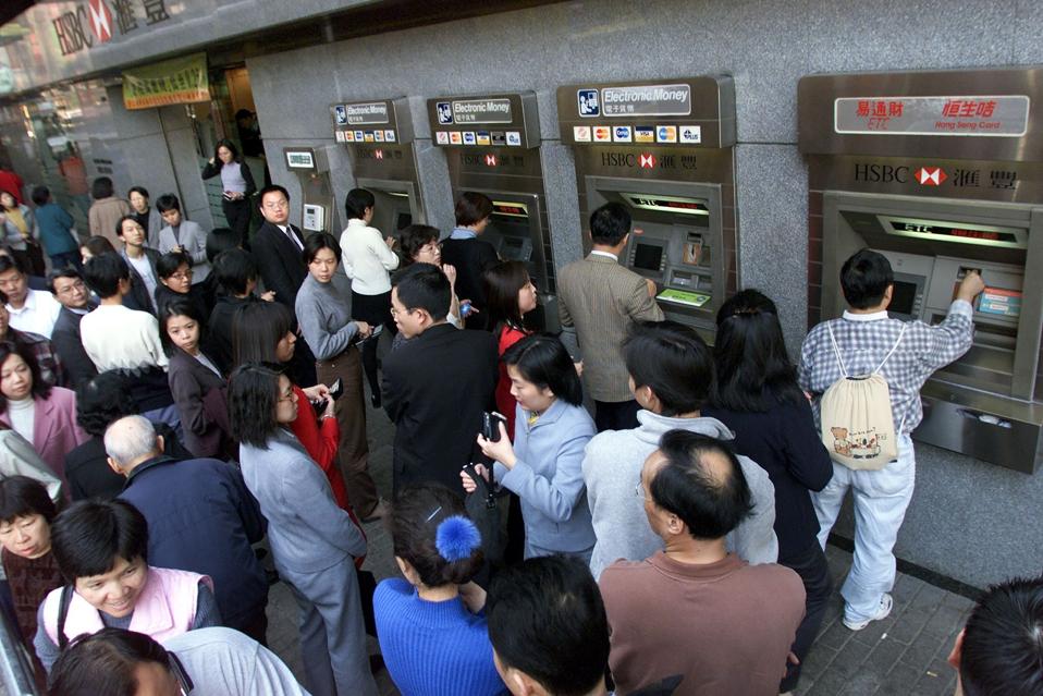 People line up at a branch of Hong Kong Bank's