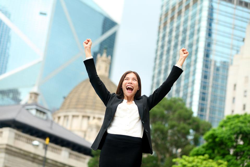 Woman celebrating reaching goals