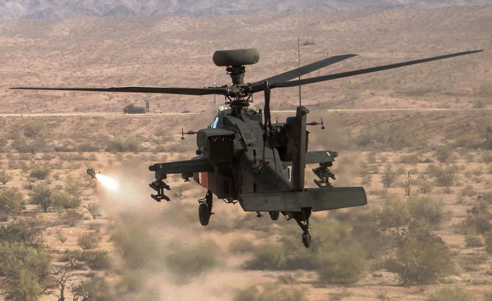 Apache attack helicopter tests JAGM missile at Yuma Proving Ground.