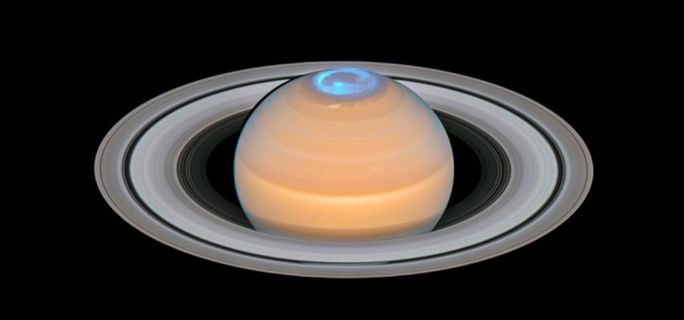 This image is a composite of observations made of Saturn in early 2018 in the optical and of the auroras on Saturn’s north pole region, made in 2017. In contrast to the auroras on Earth the auroras on Saturn are mainly visible in the ultraviolet — a part of the electromagnetic spectrum blocked by Earth’s atmosphere — and therefore astronomers have to rely on space telescopes like the NASA/ESA Hubble Space Telescope to study them.