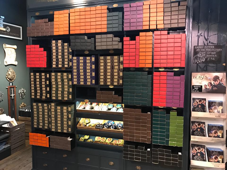 Boxes of wands pack the shelves of the Harry Potter stores