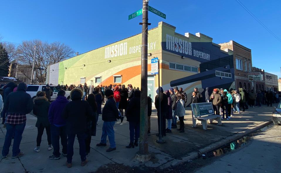 Customers line up outside Mission's South Shore dispensary in Chicago on Jan. 1, 2020, the first day of adult-use cannabis sales in Illinois.