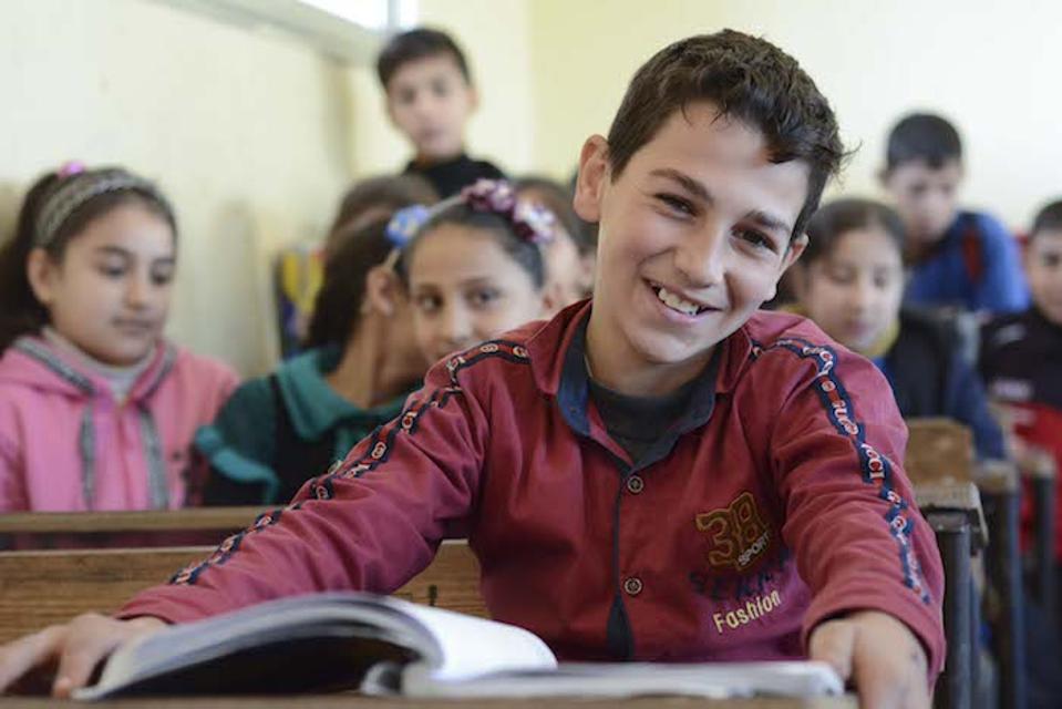 Yousef, 10, of embattled Homs, Syria, studied in a dark, dusty basement for three years after his school was damaged by fighting. In 2018, his school was rehabilitated thanks to UNICEF and partner Educate A Child.