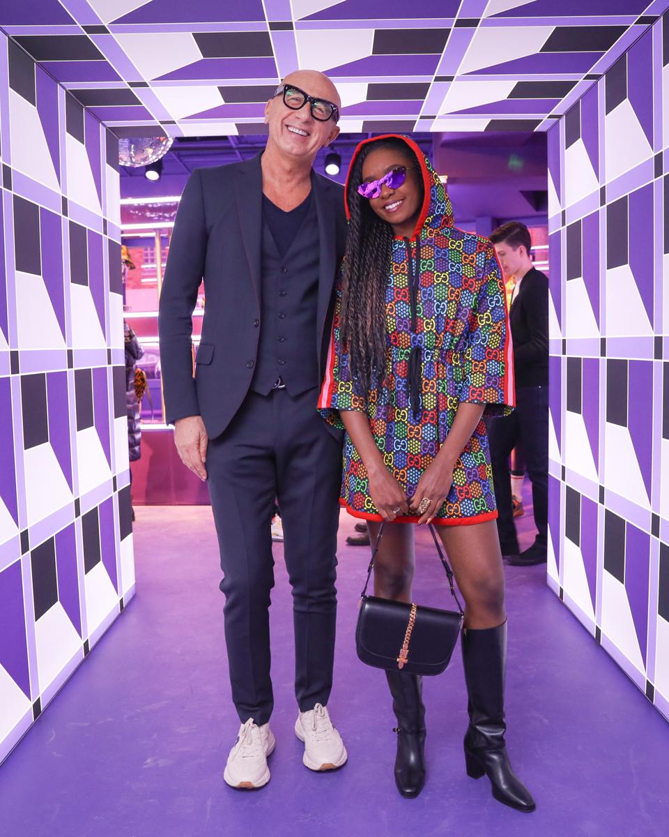 Launch party guest, Kiki Layne, with Gucci President and CEO Marco Bizzarri.