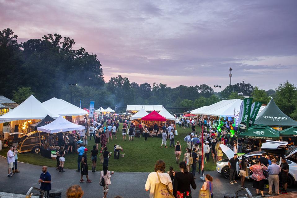 A large group of people at a food festival.