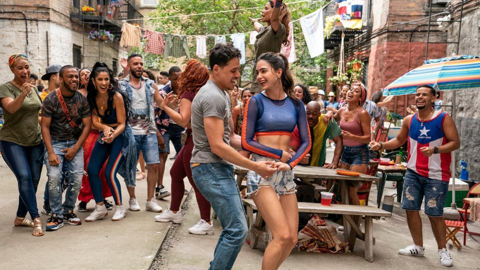 ANTHONY RAMOS as Usnavi and MELISSA BARRERA as Vanessa in IN THE HEIGHTS