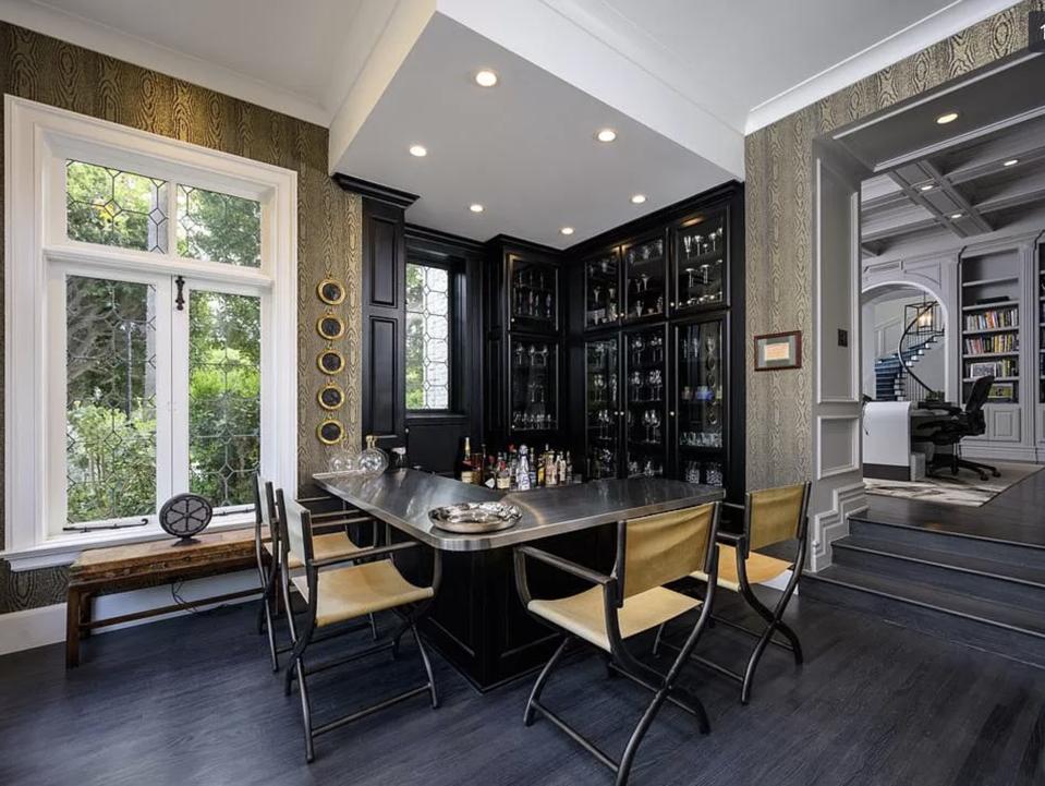 The bar is one of the features of the original home that remains after an extensive remodel.