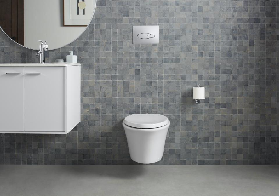 This wall-thing shower-toilet by Kohler shows the honed white actuator plate.