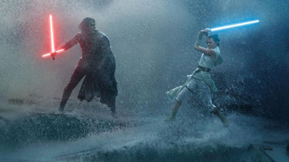 Rey and Kylo Ren battle with their lightsabers
