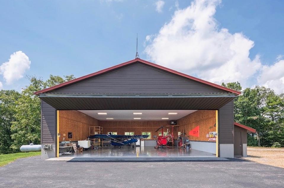 This contemporary aircraft hangar allows High Mountain's owner to come and go as he/she pleases.