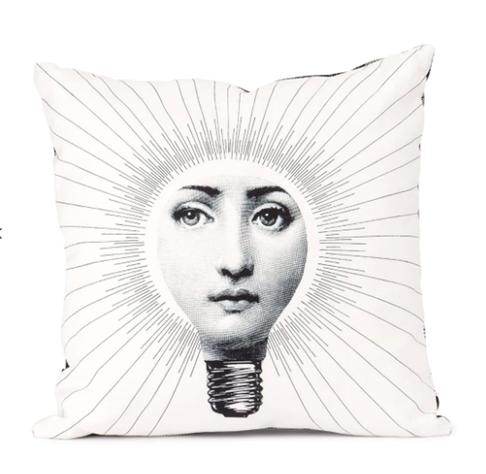 FORNASETTI Abbaglio Pillows are whimsical pieces that inspire bright ideas.