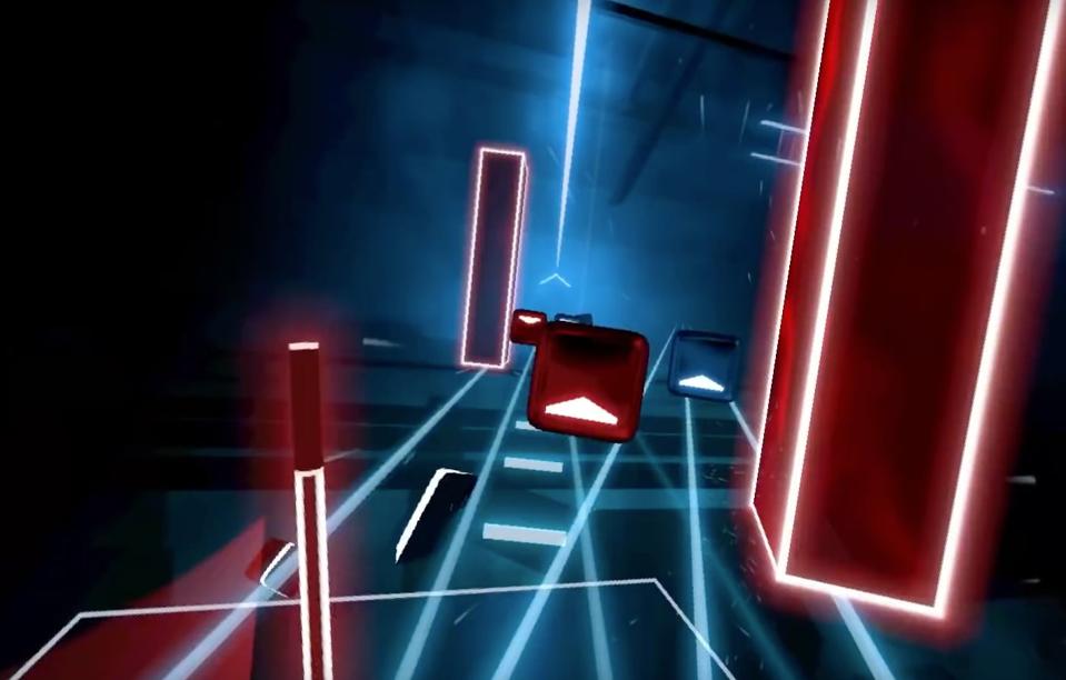 In-game footage of shapes in Beat Saber that players slice with virtual lightsabers.