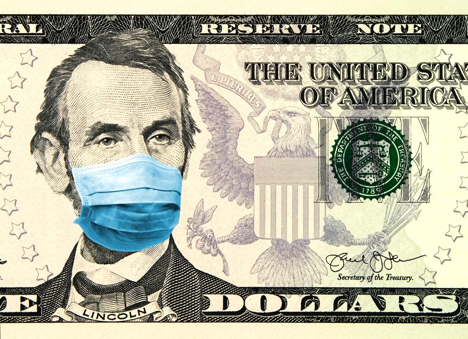 Coronavirus Wuhan Sars illness. Concept for quarantine in the United States. 5 dollar banknote where Lincoln wears a face mask. Digital montage.