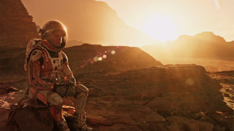 Astronaut Mark Watney sits alone on Mars as his rescue is lightyears away