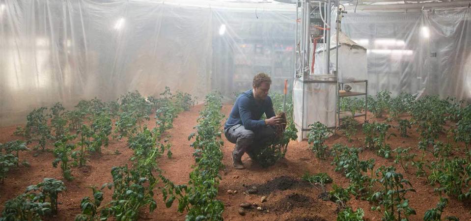 Mark Watney grows potatoes to survive on Mars