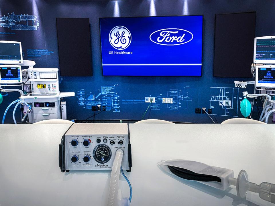 A Model A-E ventilator, left, and a simple test lung. The ventilator uses a design that operates on air pressure without the need for electricity, addressing the needs of most COVID-19 patients. Its production can be quickly scaled to help meet growing demand in the U.S.