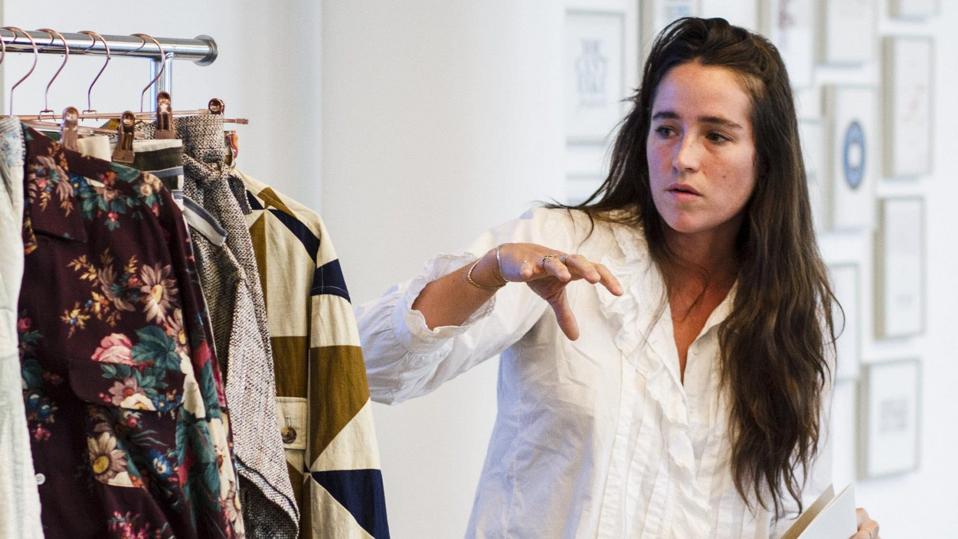 Emily Adams Bode of Bode introducing her collection of repurposed fabric designer clothing to the Elaine Gold Launch Pad fellowship.