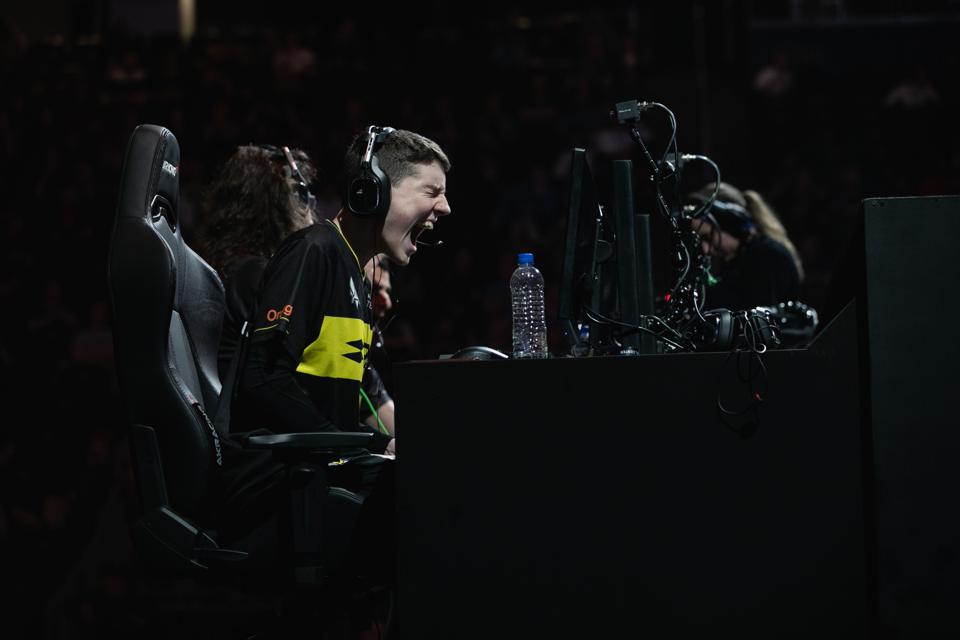 A player celebrates while playing Rocket League