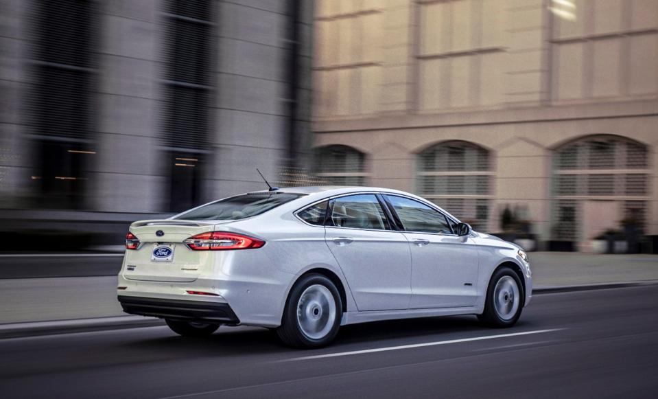 The Ford Fusion trunklid extends down flush with the rear bumper, but it features a plastic sacrifice panel to absorb minor impacts