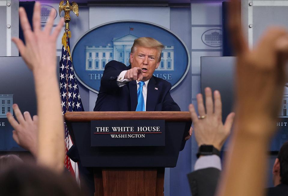 U.S. President Donald Trump speaks to reporters.