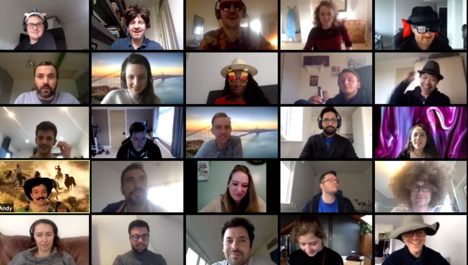 Video conference screen with employees smiling as they work on a culture initiative