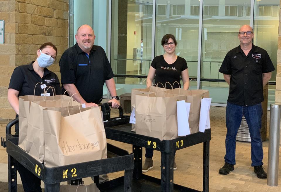 Hopdoddy employees deliver meals to Baylor Scott & White hospital