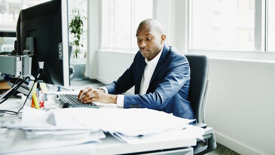 Businessman working on computer in office