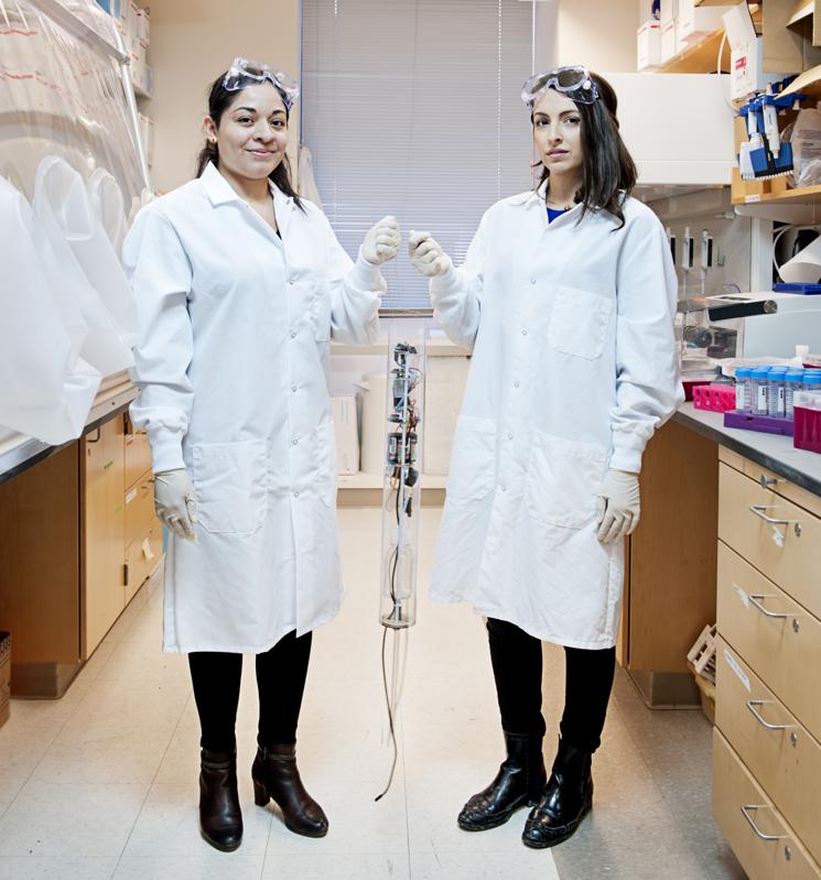 The two biobot Analytics co-founders standing in their lab in Somerville, Massachusetts.