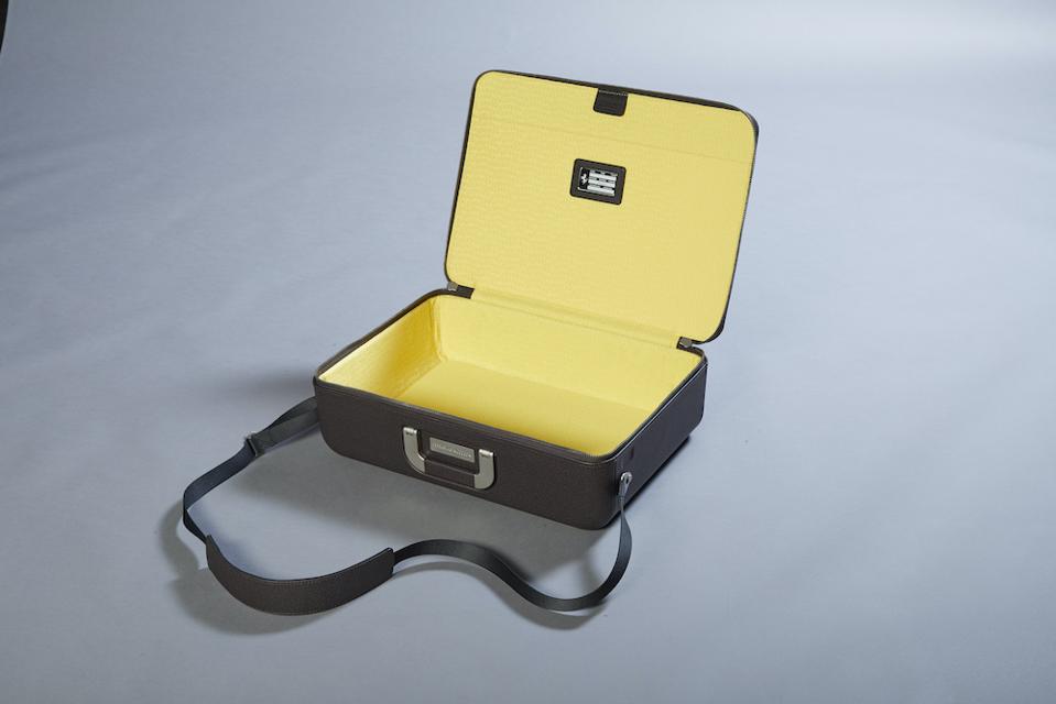 The interior yellow color of the Ferrari luggage line matches Modena’s building tradition