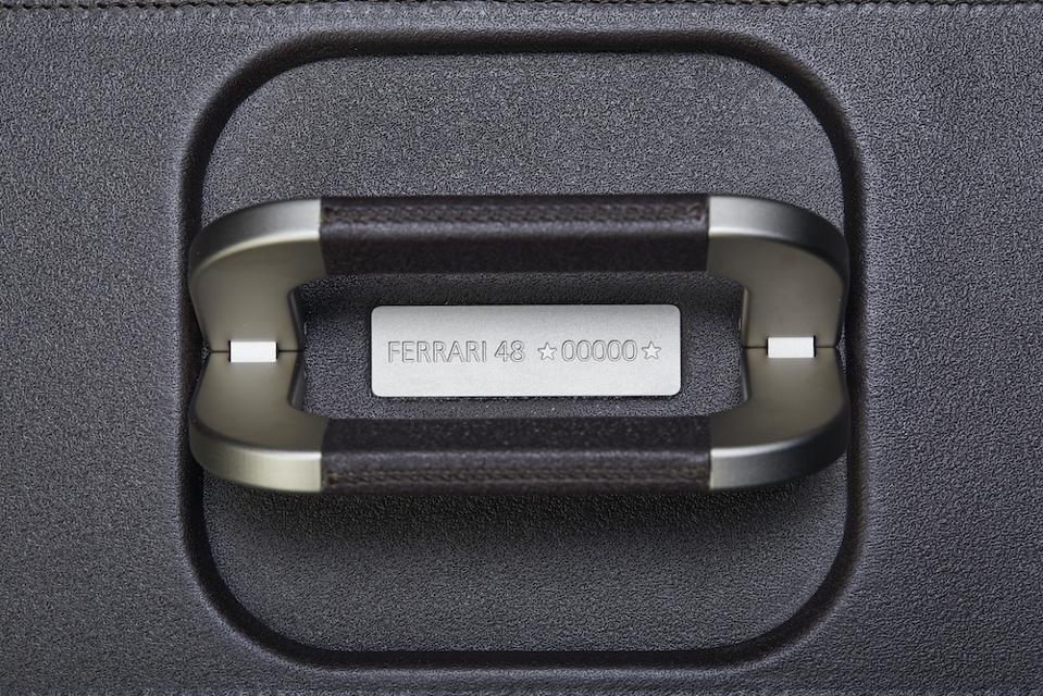 Each product in the Ferrari luggage line designed by Marc Newson has its very own chassis number