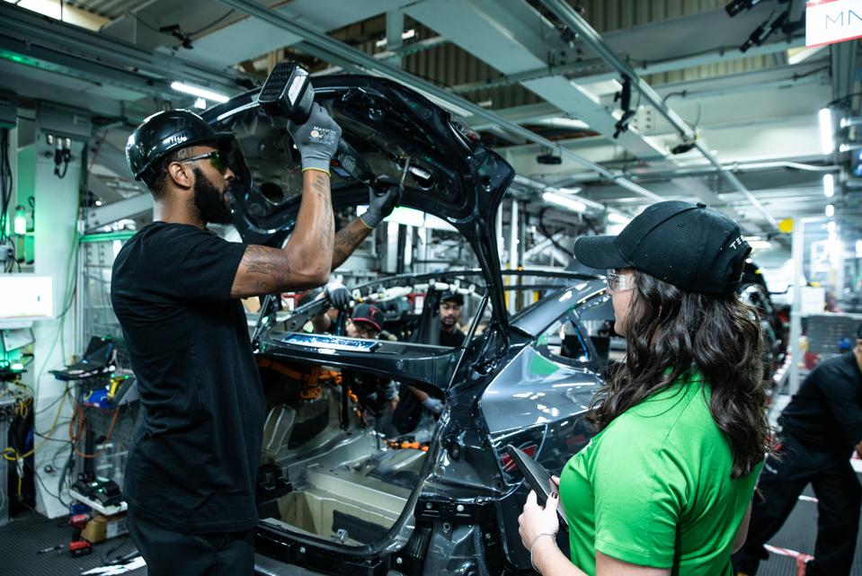 Elon Musk Tells Tesla Workers Production Is Restarting At Idled