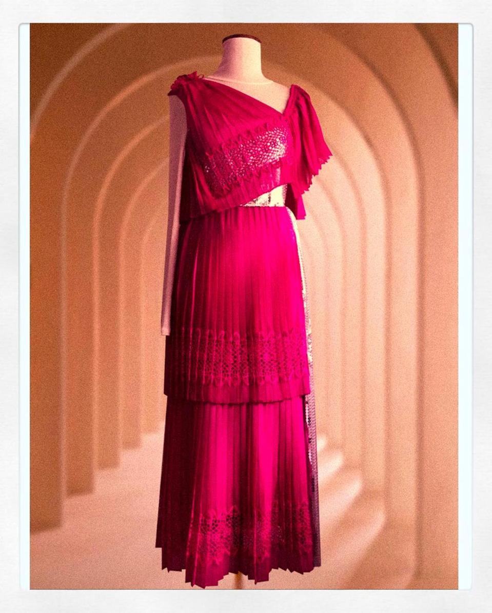 Pleated dress with silver pailettes by Lesley Mobo