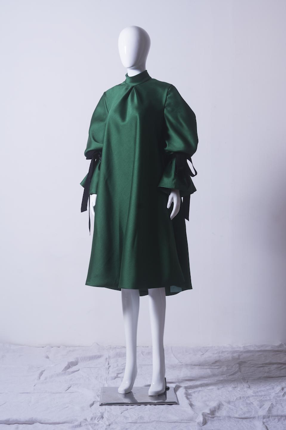 Emerald trapeze dress in gazar by Puey Quinones
