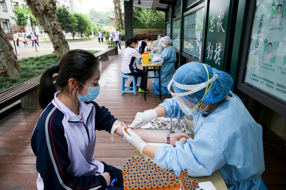 Students Receive Nucleic Acid And Serum Antibody Tests In Wuhan
