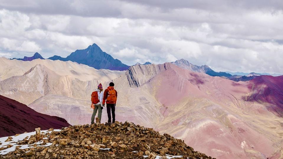 The author and a friend hiking the Ausangate trek in Peru