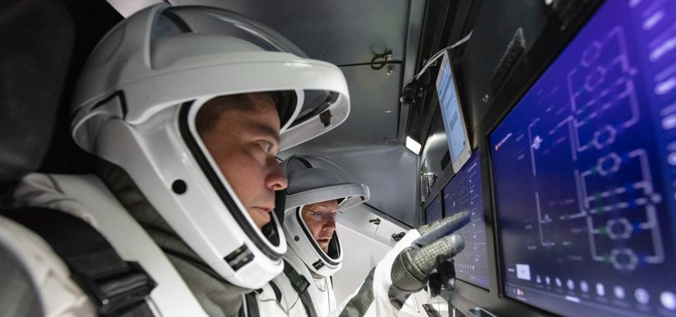 NASA astronauts Doug Hurley and Bob Behnken familiarize themselves with SpaceX’s Crew Dragon, the spacecraft that will transport them to the International Space Station as part of NASA’s Commercial Crew Program.