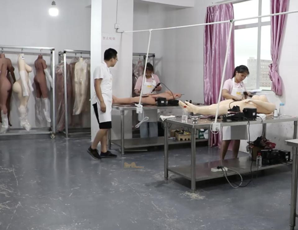 At a sex doll factory employees work on the mannequins