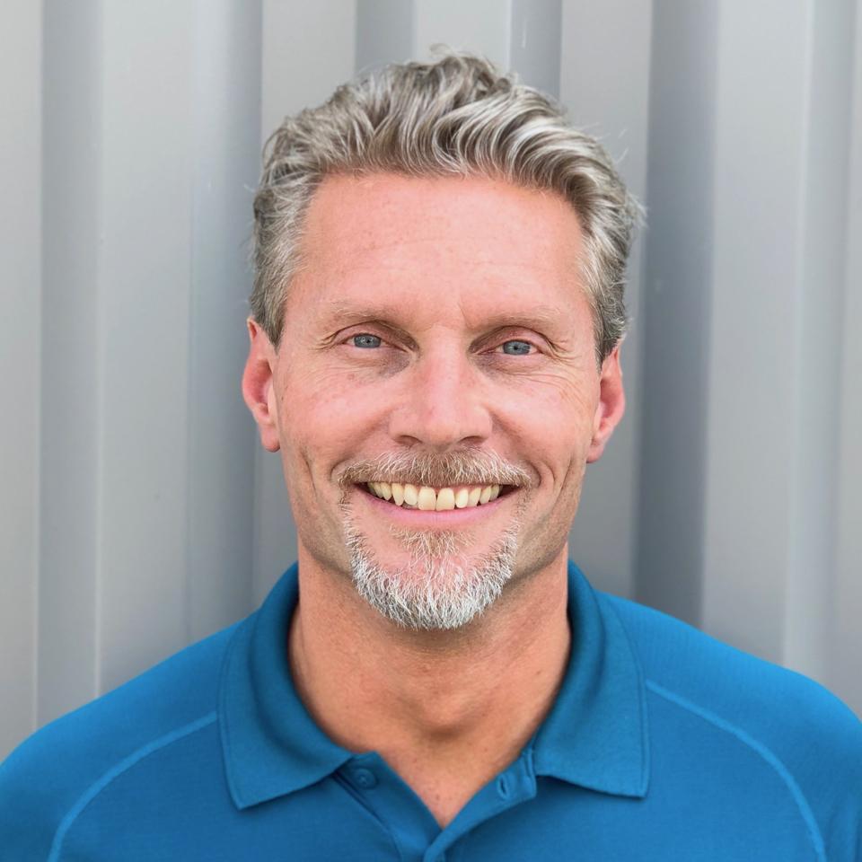 Nice headshot of Alex Rowland
