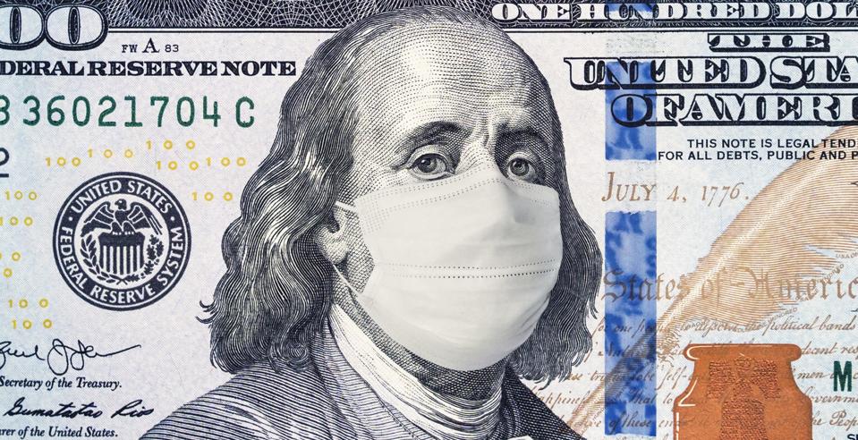 American President with face mask against CoV infection. 100 dollar banknote. Coronavirus in United States. Concept quarantine and recession. Global economy hit by corona virus outbreak and pandemic