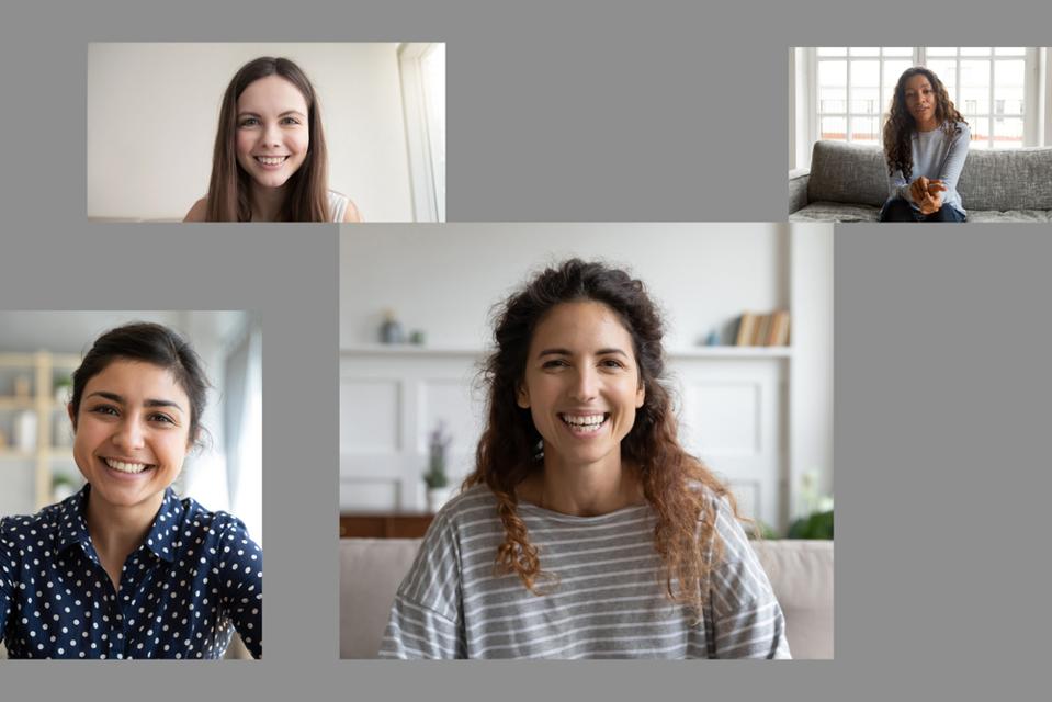 Diverse females participating in a virtual meeting from their homes.