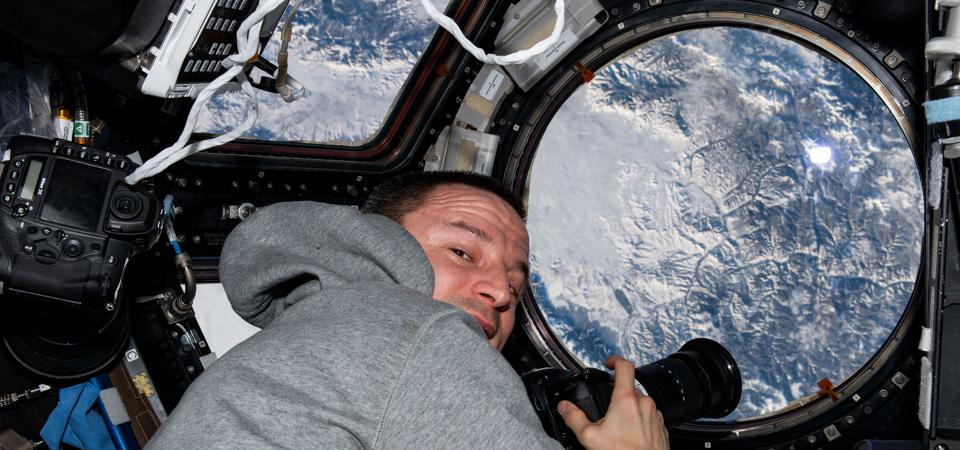 NASA astronaut and Expedition 61 Flight Engineer Andrew Morgan photographs the Earth below as the International Space Station orbited 261 miles above Russia just north of the Mongolian border.