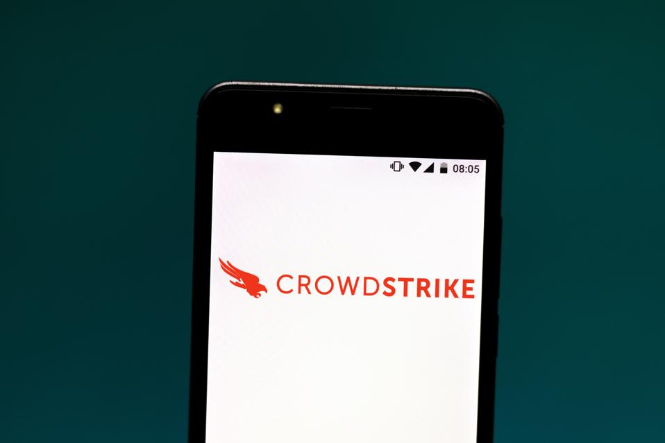 In this photo illustration the CrowdStrike logo is seen...