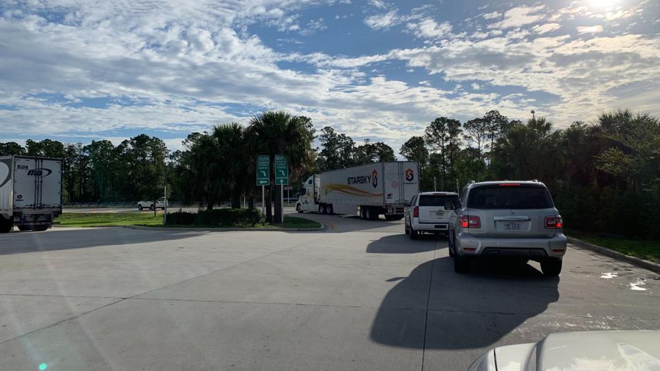 Image: https://specials-images.forbesimg.com/imageserve/5ed520ac570be80006473f04/A-truck-with-no-driver-followed-by-two-SUVs-heads-onto-the-highway/960x0.jpg?cropX1=0&cropX2=4032&cropY1=374&cropY2=2642 A truck with no driver followed by two SUVs heads onto the highway