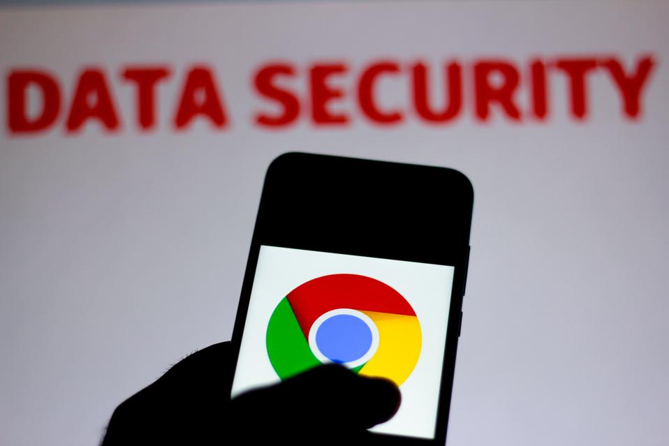 In this photo illustration the Google Chrome logo is seen...